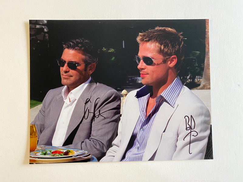BRAD PITT and GEORGE CLOONEY autographed "Oceans 11" 11x14 photo