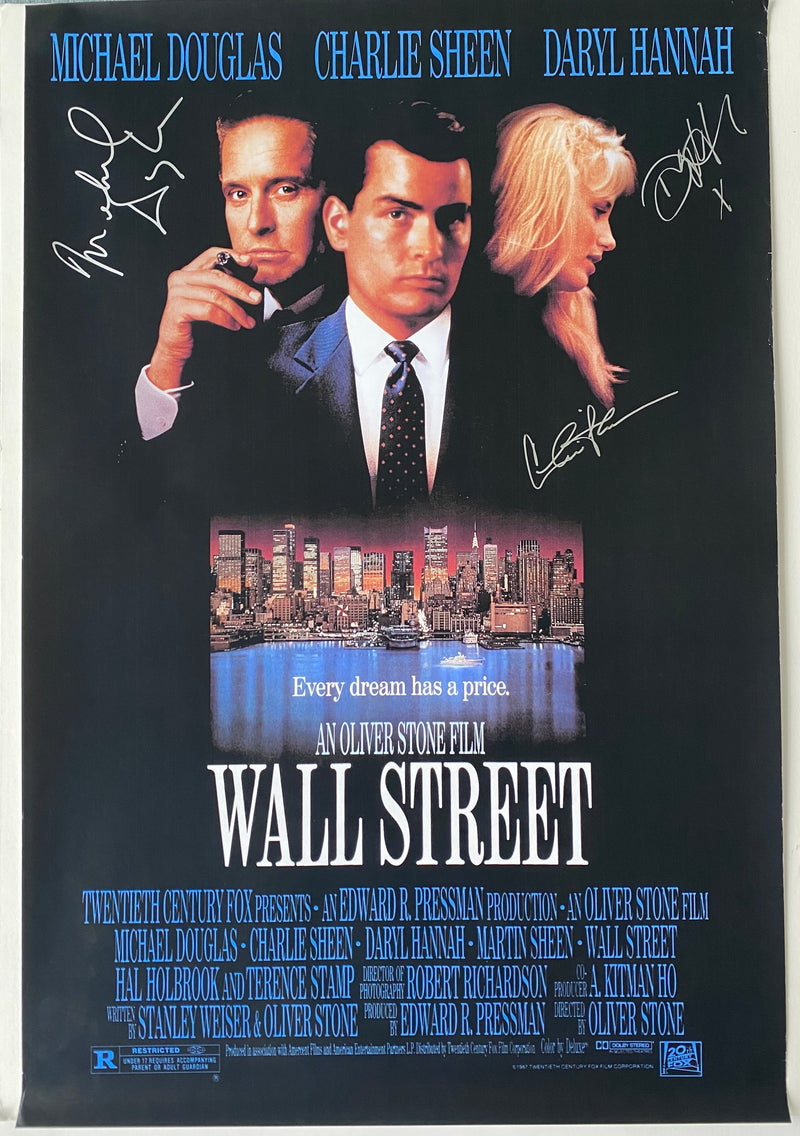 "WALL STREET" autographed by MICHAEL DOUGLAS, CHARLIE SHEEN, and DARYL HANNAH