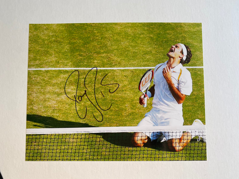 ROGER FEDERER autographed "Winning Wimbledon" 11x14 photo